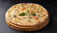 Pizzanın sağlık üzerindeki etkileri: Yağlanmamak için uzak durun...