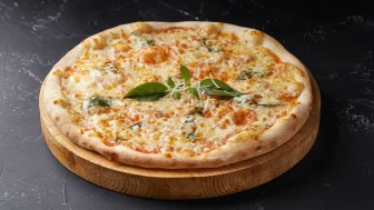Pizzanın sağlık üzerindeki etkileri: Yağlanmamak için uzak durun...
